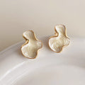 Pendientes Irregulares Cloud Bañados en Oro 14k